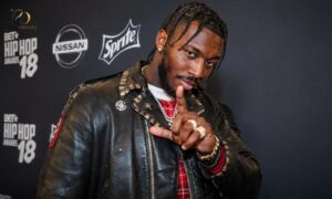 Pardison Fontaine at a music event showcasing the rapper and songwriter behind Pardison Fontaine net worth